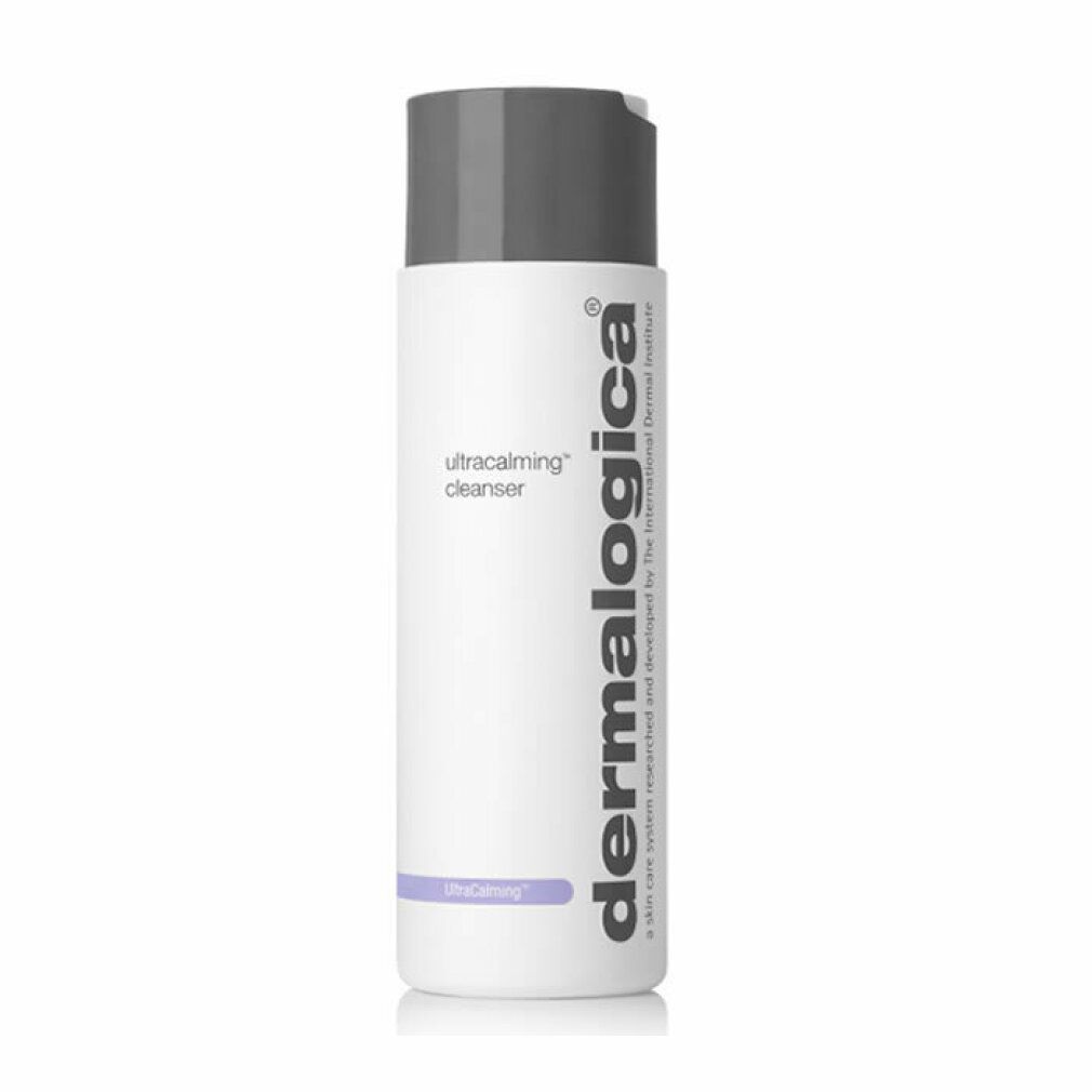 Flacone cilindrico con tappo grigio. Scritta UltraCalming Cleanser e Dermalogica. Accento viola.