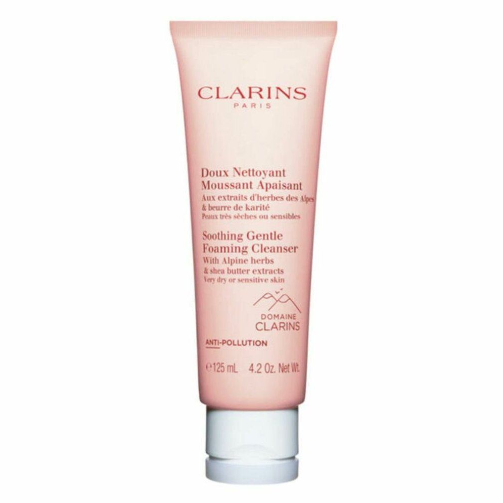 Tubo rosa con tappo bianco. Testo: Clarins Paris, Doux Nettoyant Moussant Apaisant, Soothing Gentle Foaming Cleanser. Anti-Pollution.