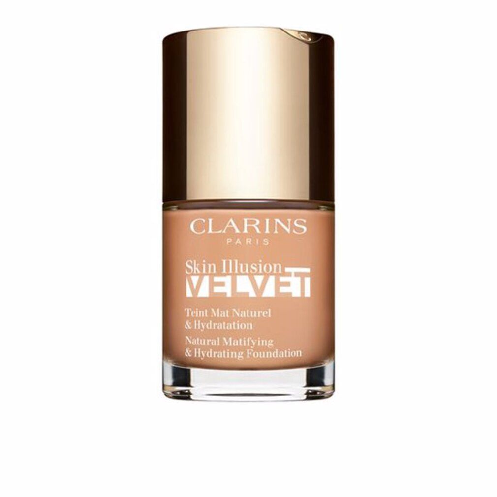 Fondotinta Clarins Skin Illusion Velvet. Flacone con tappo dorato. Testo: Natural Mattifying & Hydrating Foundation.