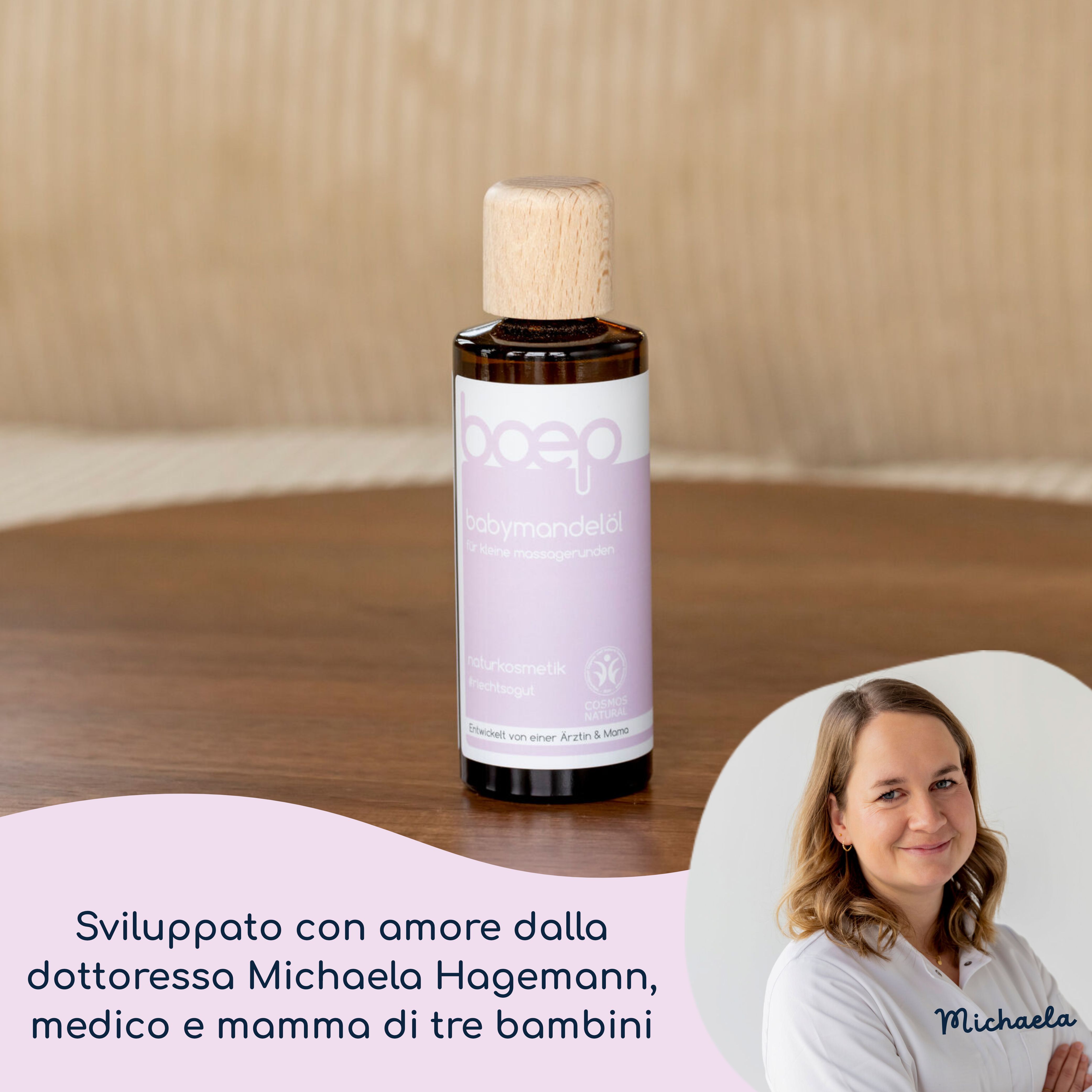 Flacone di vetro marrone con tappo in legno. Scritta: Babymandelöl. Logo: boep. Sviluppato con amore dalla Dr. Michaela Hagemann.