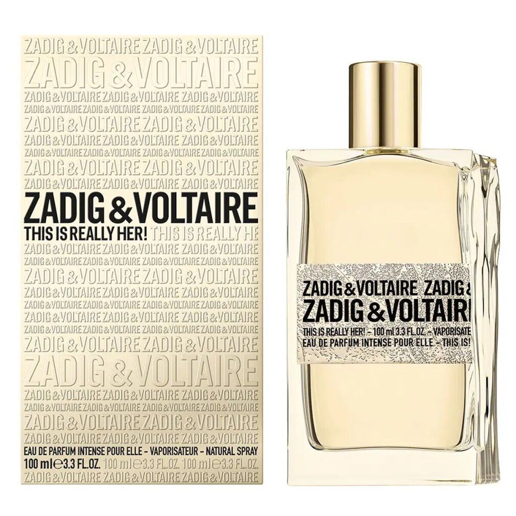 Flacone di profumo accanto alla confezione. Flacone con tappo dorato. Confezione con logo del marchio. Flacone in vetro trasparente.