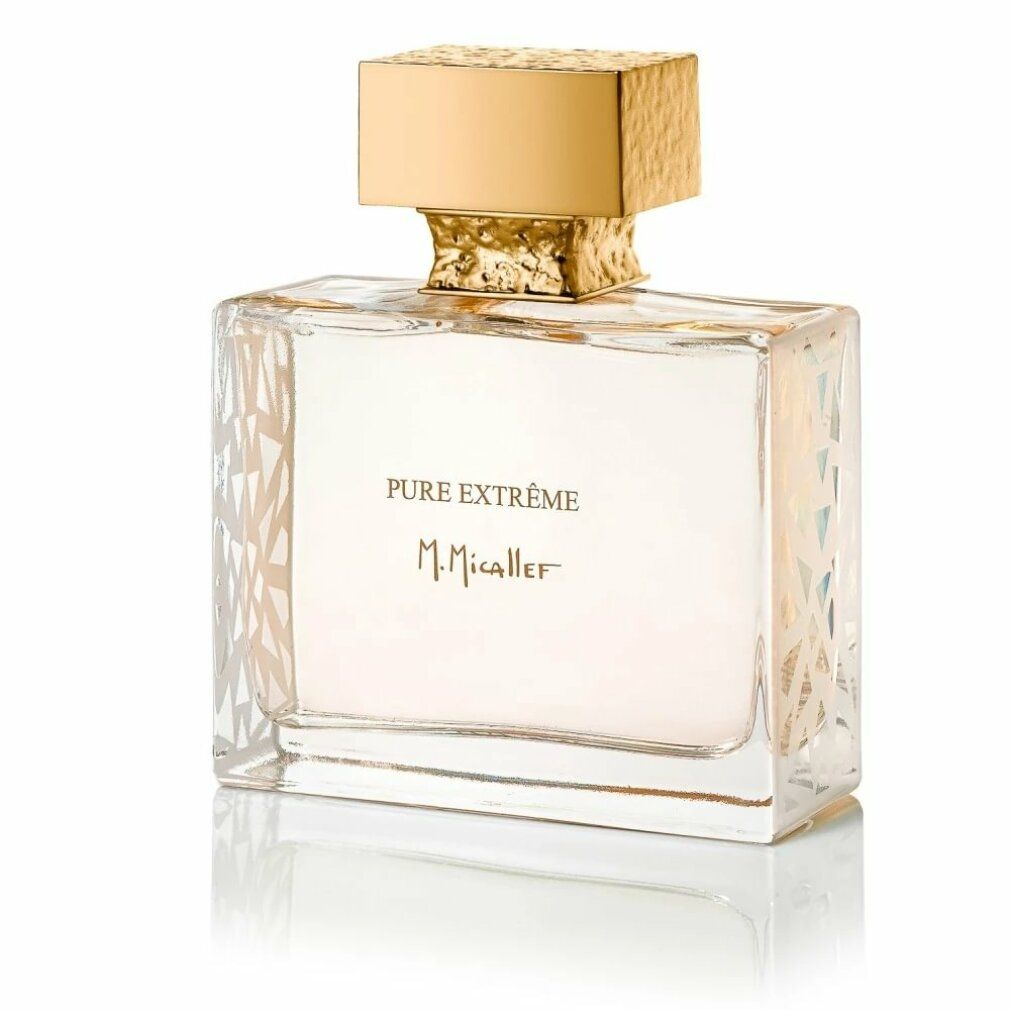 Flacone di profumo con tappo dorato. Scritta PURE EXTRÊME M.Micallef. Forma rettangolare con motivo.