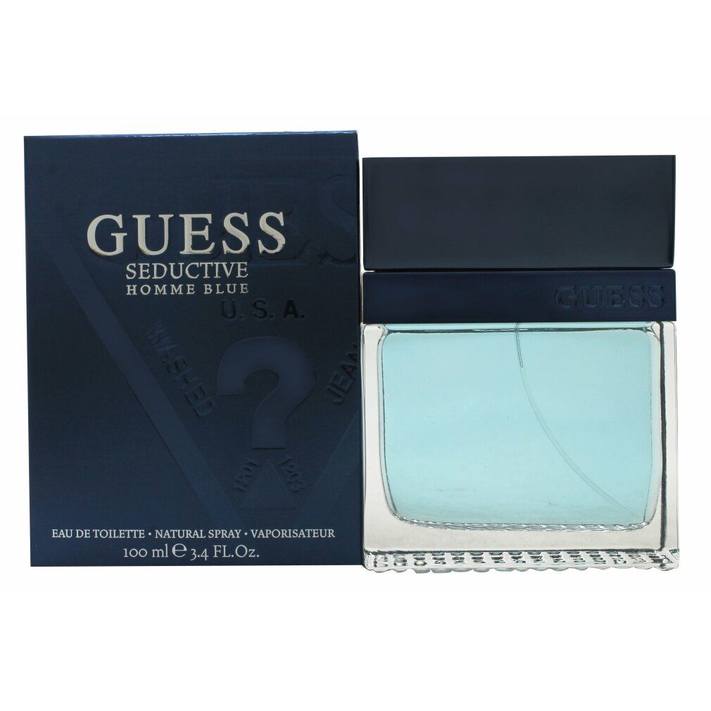 Flacone di profumo blu e scatola. Scritta: GUESS Seductive Homme Blue. Eau de Toilette. 100 ml.