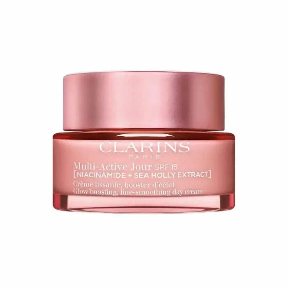 Vasetto di crema rosa con coperchio. Scritta: Clarins, Multi-Active Jour SPF15. Testo: Crème lissante, booster d'éclat.