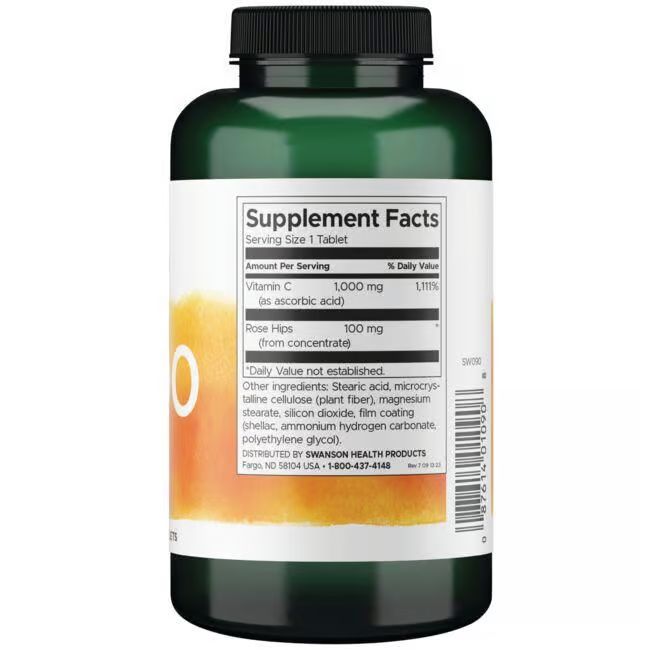 Retro del flacone verde. Etichetta bianca con informazioni nutrizionali. Contiene vitamina C e rosa canina.