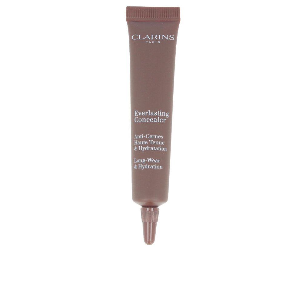 Tubo correttore marrone. Scritte: CLARINS PARIS, Everlasting Concealer, Anti-Cernes Haute Tenue & Hydratation, Long-Wear & Hydration.