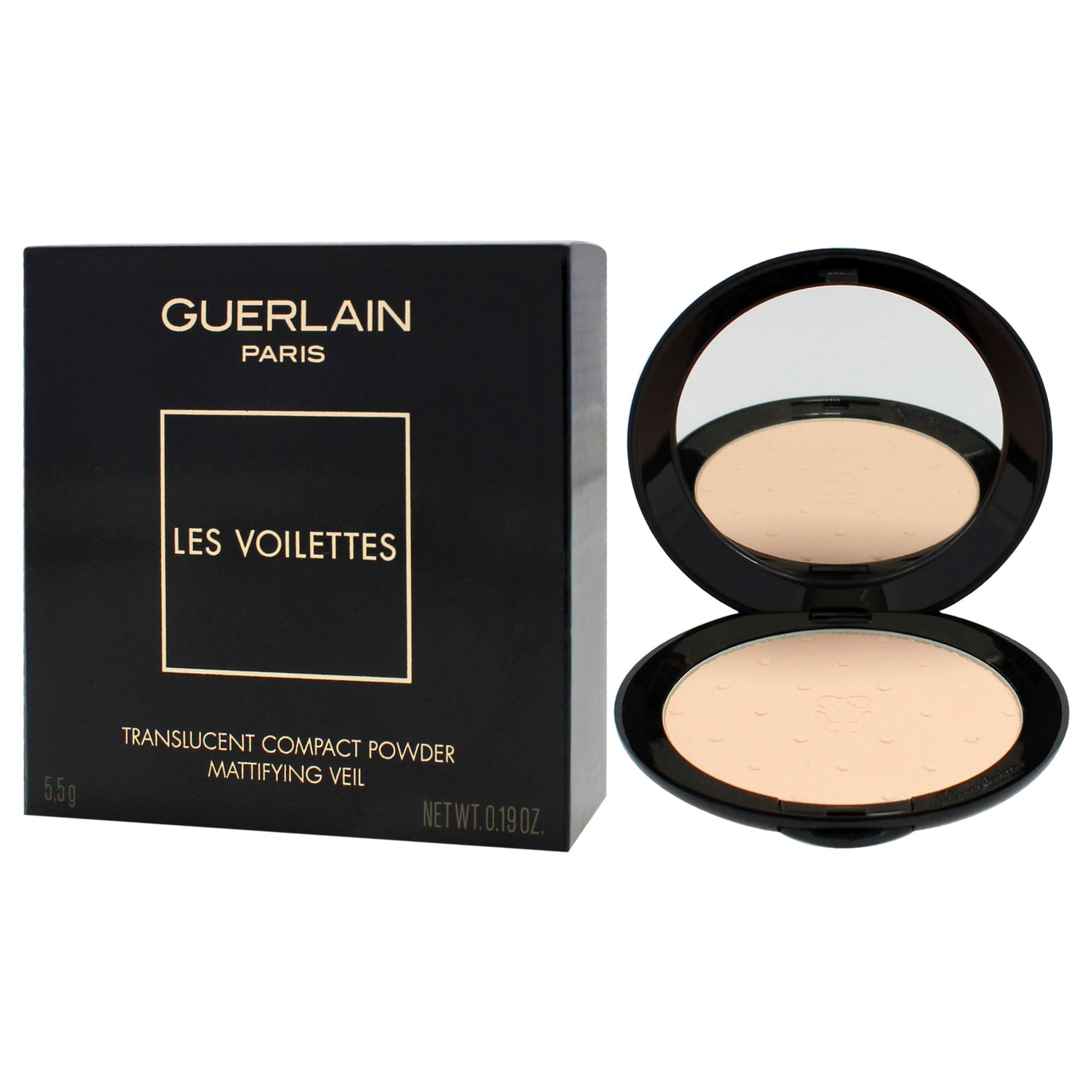 Cipria compatta con specchio. Astuccio nero aperto. Cipria beige chiaro. Testo: Guerlain, Les Voilettes, Translucent Compact Powder, Mattifying Veil.