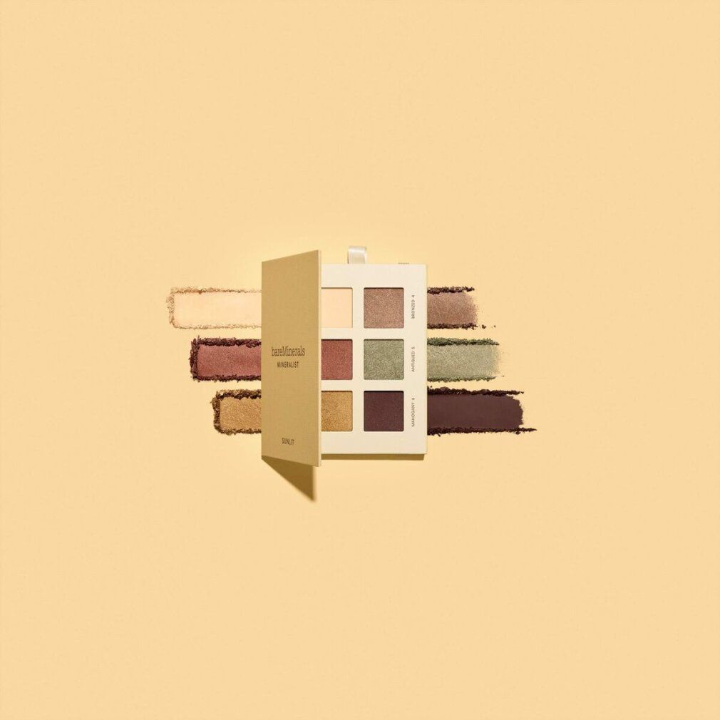 Una palette di ombretti aperta con nove tonalità quadrate in colori neutri e terrosi, con campioni di colore accanto.