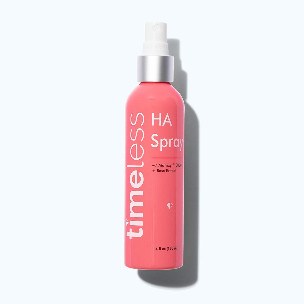 Flacone spray rosa con erogatore bianco. Scritta: timeless, HA Spray, Matrixyl 3000, Rose Extract. 4 fl oz (120 ml).