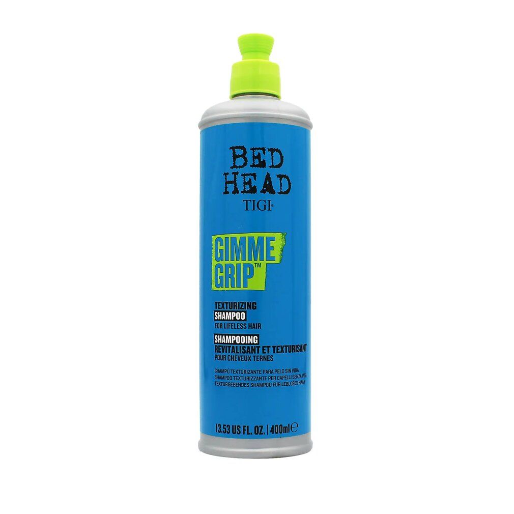Flacone di shampoo blu turchese con erogatore verde. Scritta: Bed Head TIGI Gimme Grip Texturizing Shampoo.