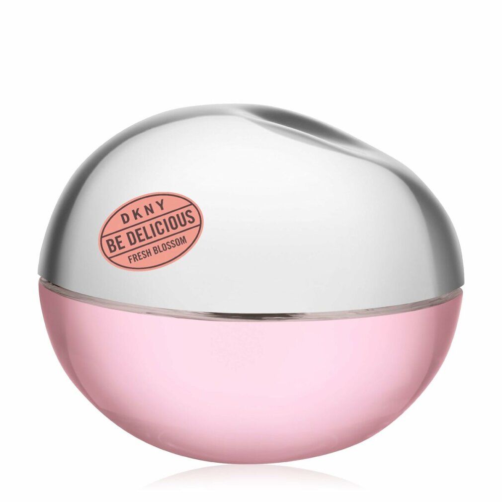 Flacone rotondo rosa con tappo argentato. Scritta: DKNY Be Delicious Fresh Blossom.