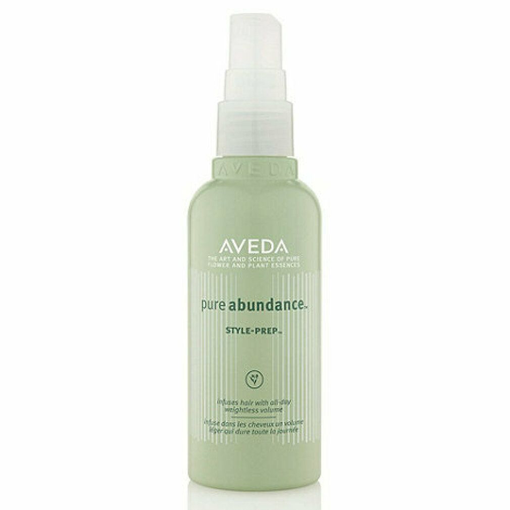 Flacone verde con vaporizzatore bianco. Scritta: Aveda, pure abundance, Style-Prep. Testo: Infuse hair with all-day weightless volume.