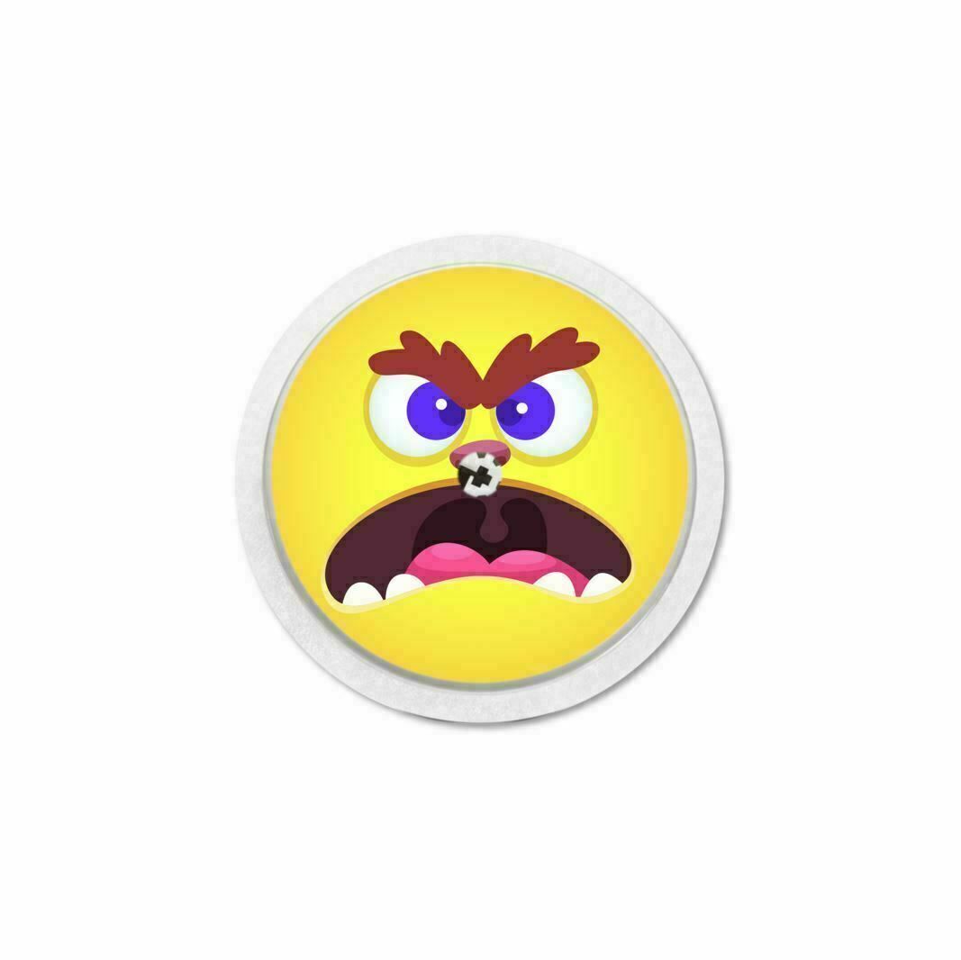 Adesivo rotondo giallo con una faccia da mostro. La faccia ha sopracciglia marroni, occhi rossi e bocca aperta.