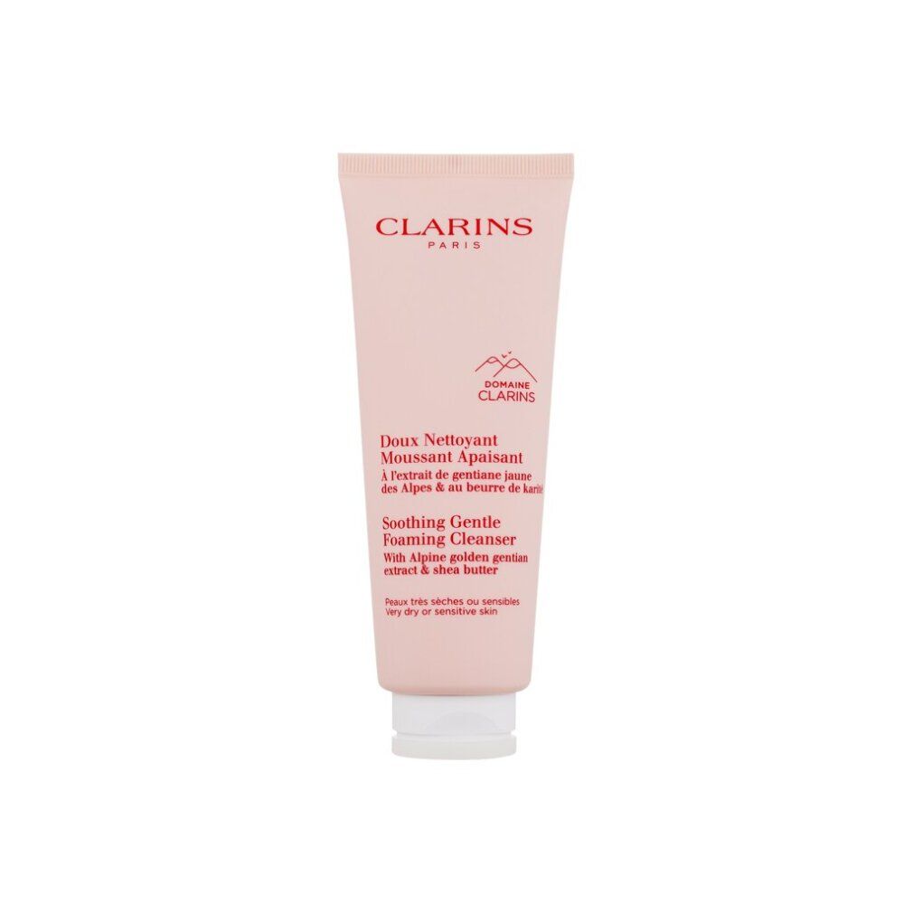 Tubo rosa con tappo bianco. Testo: Clarins Paris, Doux Nettoyant Moussant Apaisant, Soothing Gentle Foaming Cleanser. Anti-Pollution.