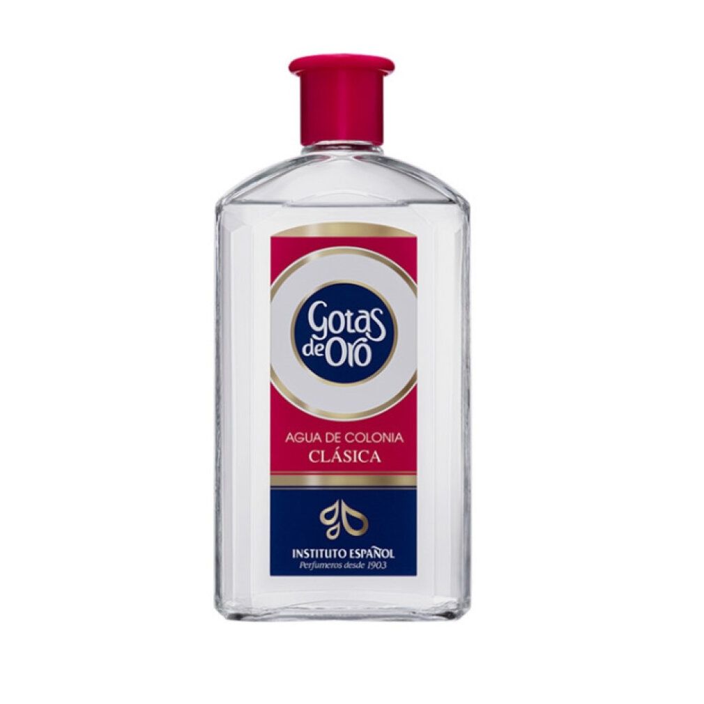 Flacone trasparente con tappo rosso. Etichetta "Gotas de Oro" e "Agua de Colonia Clásica". "Instituto Español" in basso.