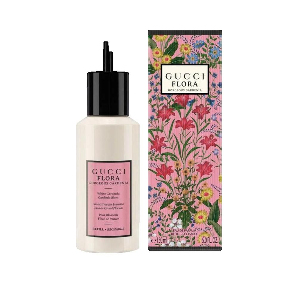 Flacone bianco con tappo nero ed etichetta rosa. Accanto, una scatola con design floreale e nome del prodotto.