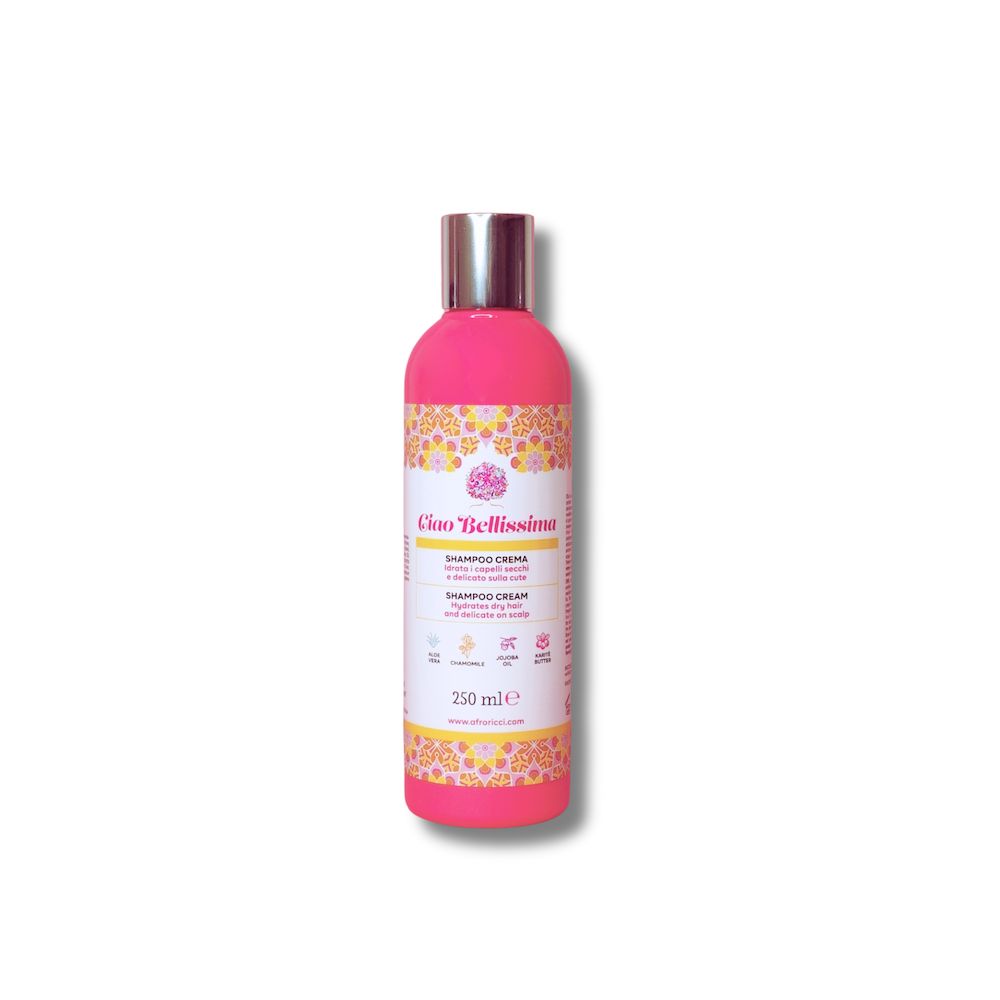 Flacone rosa con tappo argentato. Scritta: Ciao Bellissima, Shampoo Crema. Decorazioni gialle e rosa. 250 ml.