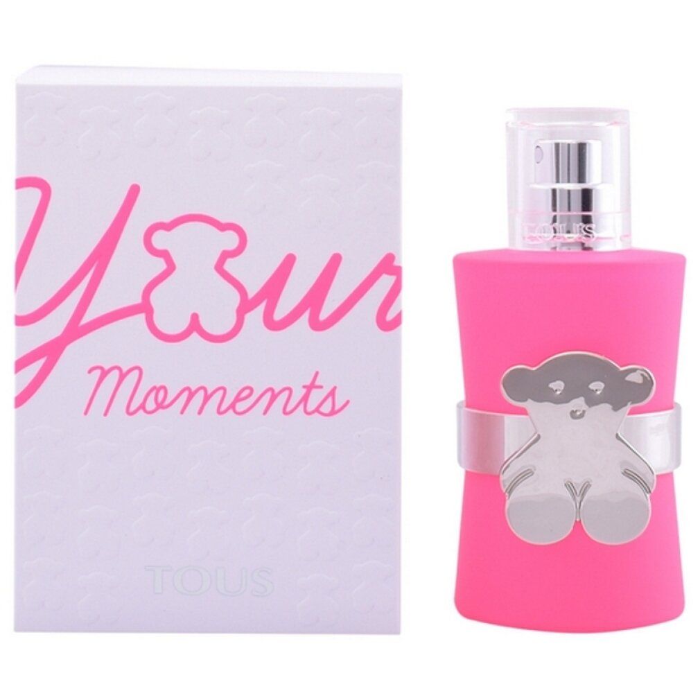Flacone rosa con orsetto argentato e confezione bianca con scritta "Your Moments".