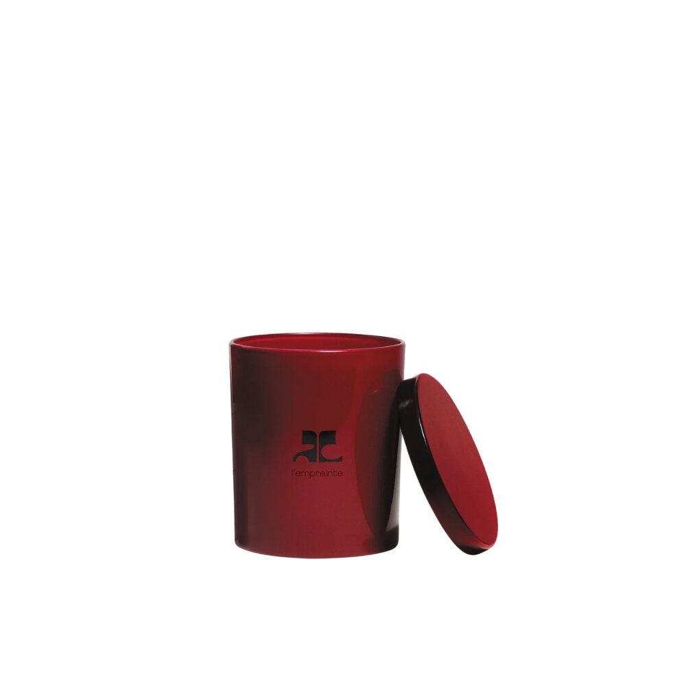 Candela profumata rossa con coperchio. Il logo e la scritta "empreinte" sono visibili sulla candela.