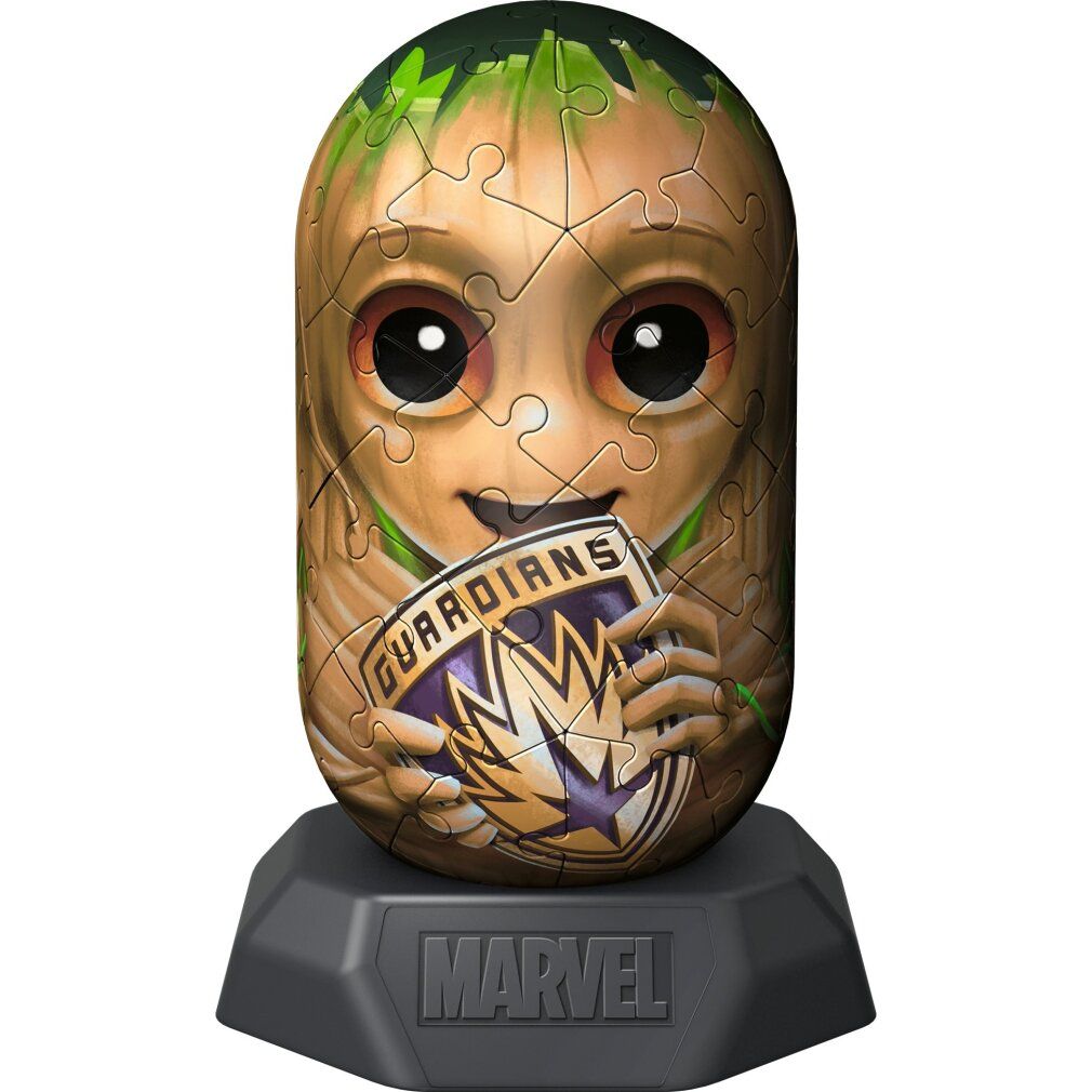 Puzzle 3D Groot Hylkies, 54 pezzi. Figura di Groot con scudo. Base nera con logo Marvel. Pezzi del puzzle visibili.