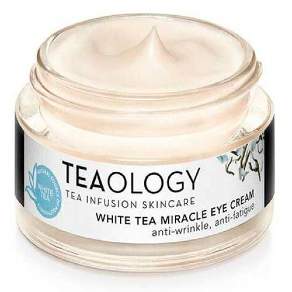 Vasetto di vetro con crema bianca. Scritta: TEAOLOGY, White Tea Miracle Eye Cream. Coperchio in vetro.