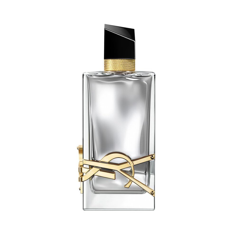 Flacone di profumo. Flacone quadrato in vetro con logo dorato e tappo nero. Dettagli dorati.