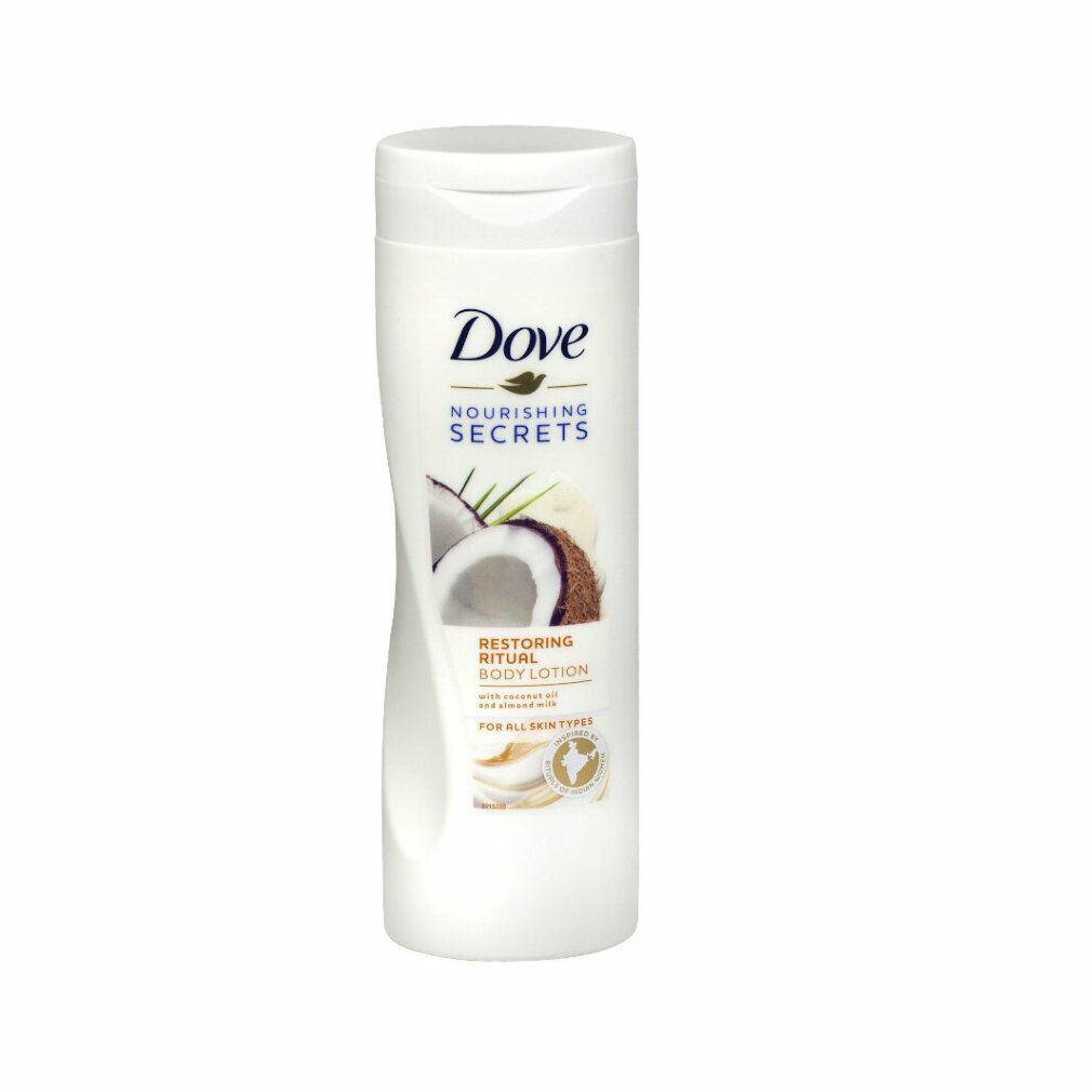 Flacone Dove bianco con illustrazione di cocco. Testo: Nourishing Secrets, Restoring Ritual Body Lotion. Per tutti i tipi di pelle. Con olio di cocco.