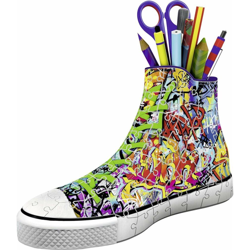 Sneaker Graffiti assemblata. Design graffiti colorato. Contiene penne, forbici. Suola bianca. 21,4 cm.