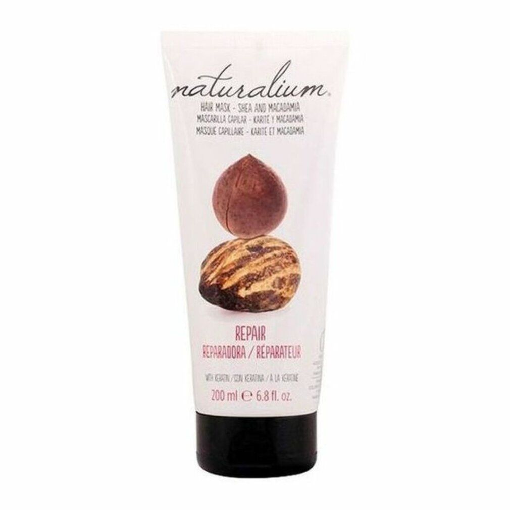 Tubo di maschera per capelli. Scritta: Naturalium, Shea e Macadamia. Illustrazione di noci. Testo: Repair, 200 ml.