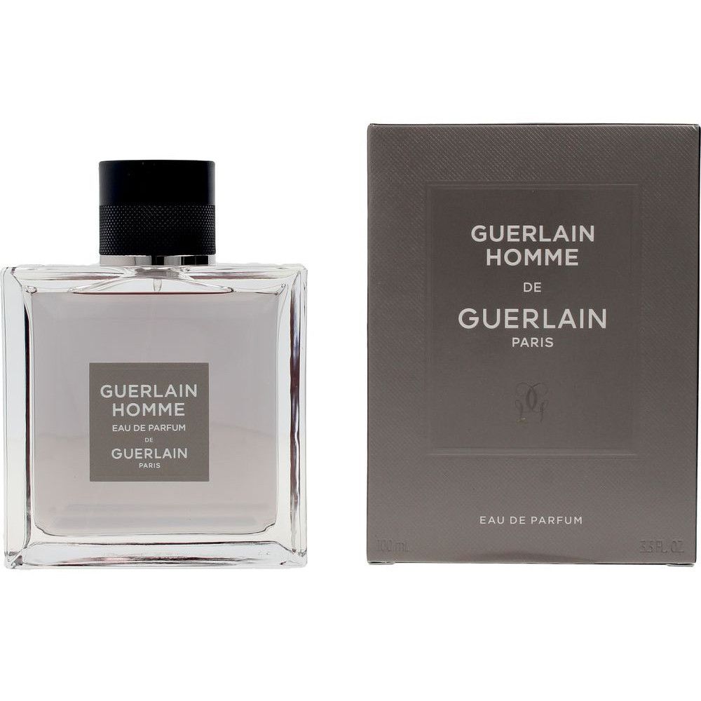 Flacone in vetro con tappo nero e confezione rettangolare. Scritta: Guerlain Homme, Eau de Parfum, Guerlain Paris.