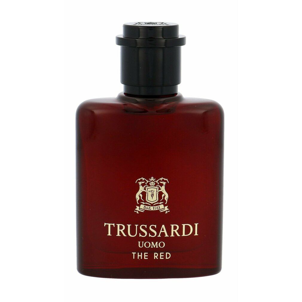 Flacone rosso con tappo nero. Logo e scritta sul flacone. Scritta: Trussardi Uomo The Red.