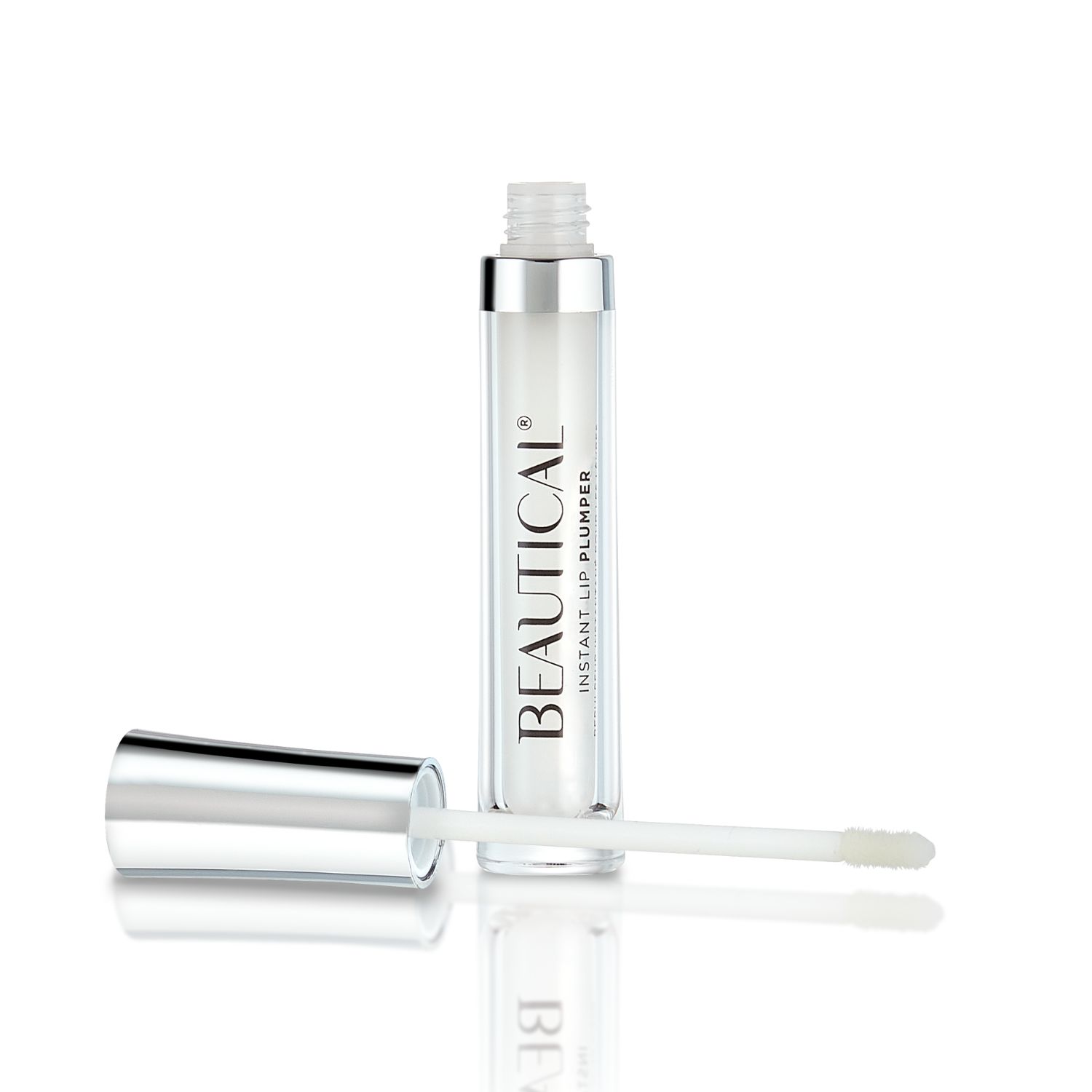 BEAUTICAL Instant Lip Plumper. Tubo trasparente con tappo argento e applicatore. Prodotto accanto al tappo.