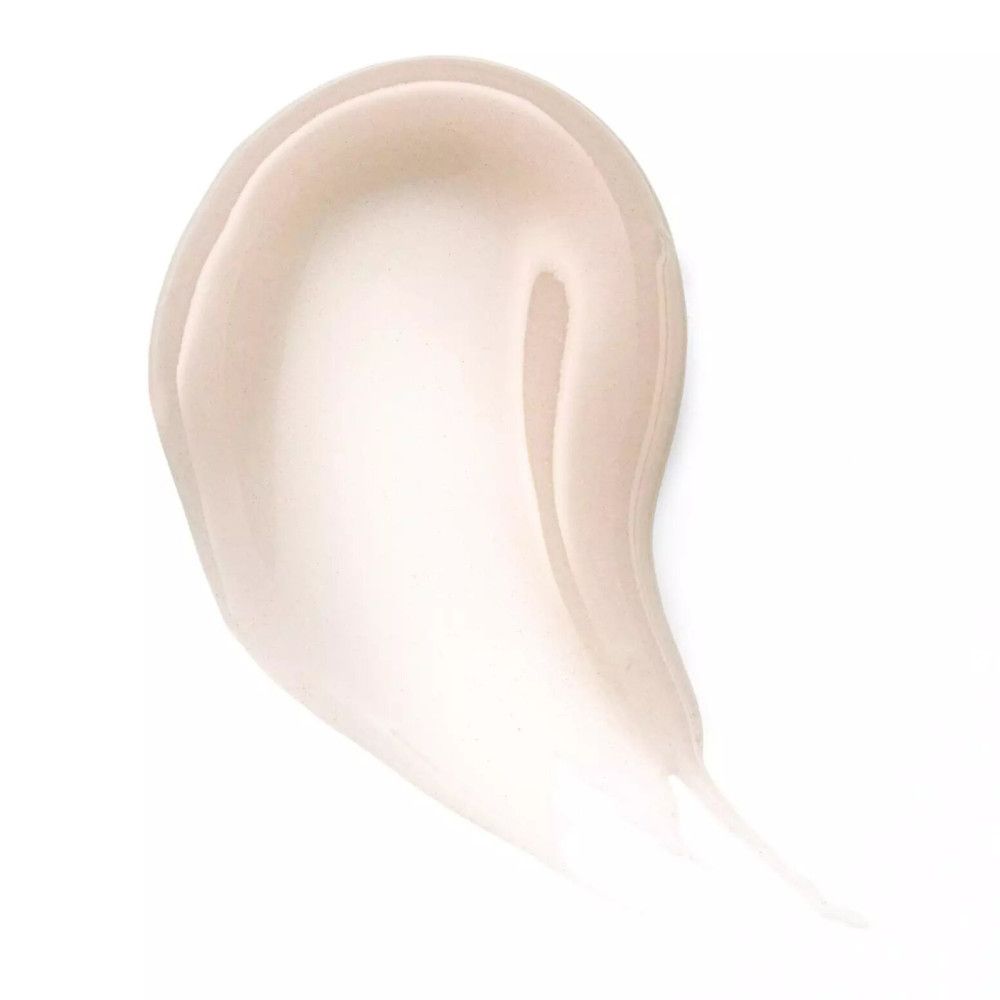 Texture di balsamo labbra spalmata. Tonalità: rosa chiaro. Forma: curva.