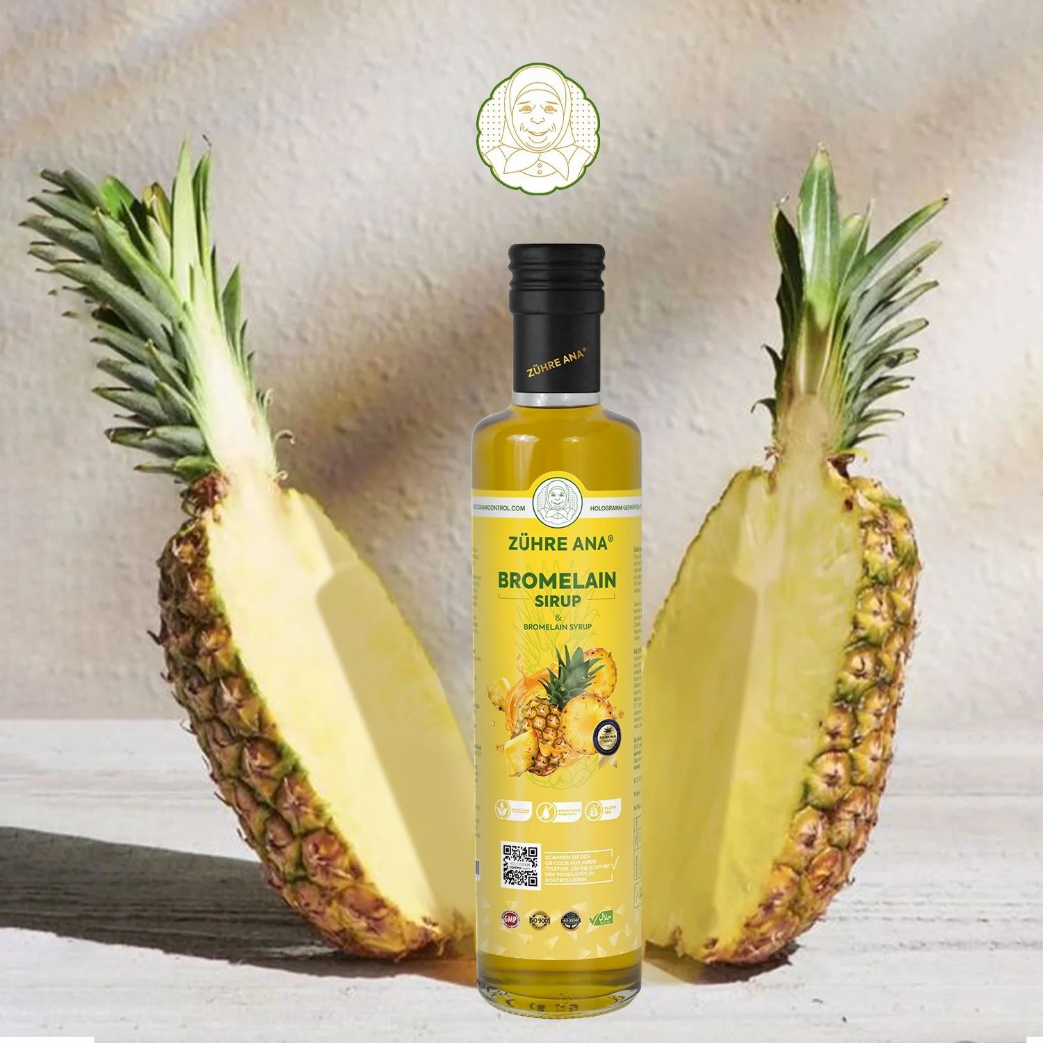 Bottiglia gialla con tappo nero. Scritta: Zühre Ana Bromelain Sciroppo. Accanto, un ananas a metà.