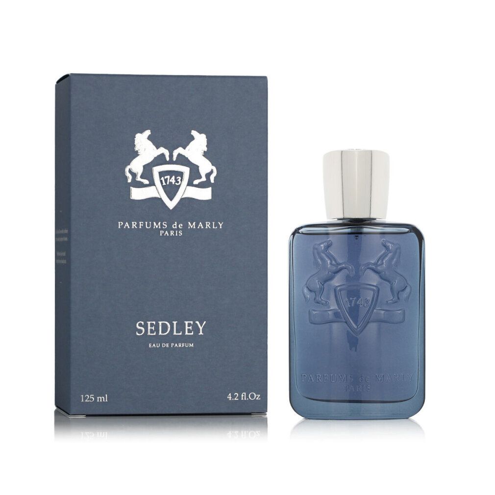 Flacone di profumo blu e scatola. Sulla scatola, Sedley Eau de Parfum. Marchio: Parfums de Marly.