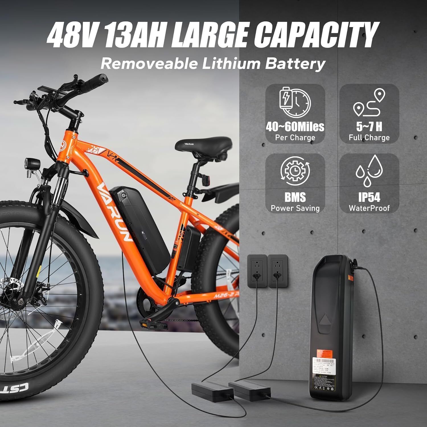 E-MTB arancione con batteria rimovibile. Testo: 48V 13AH LARGE CAPACITY. Tempi di ricarica e autonomia.
