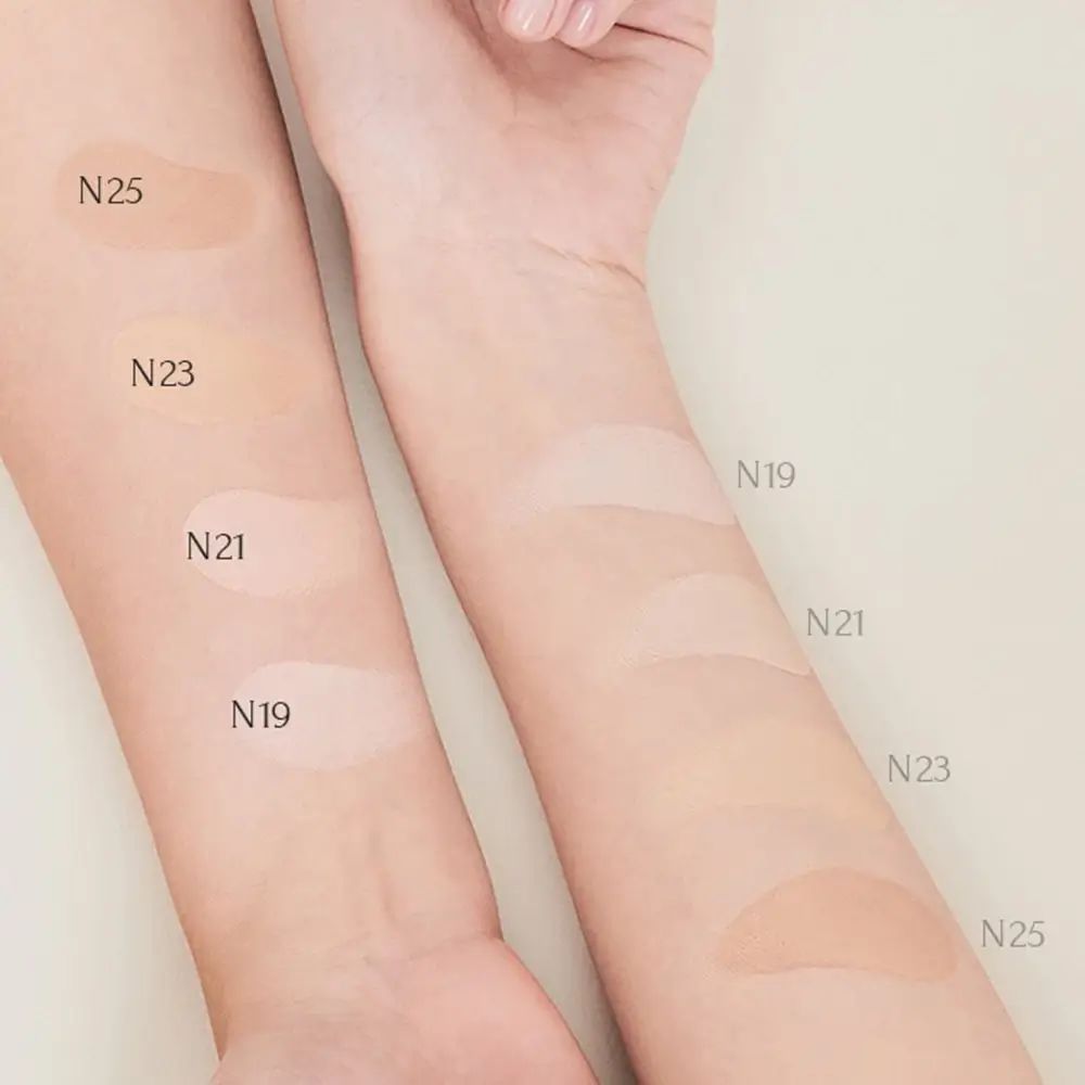 Braccia con diverse tonalità di trucco. Numeri colore: N19, N21, N23, N25.