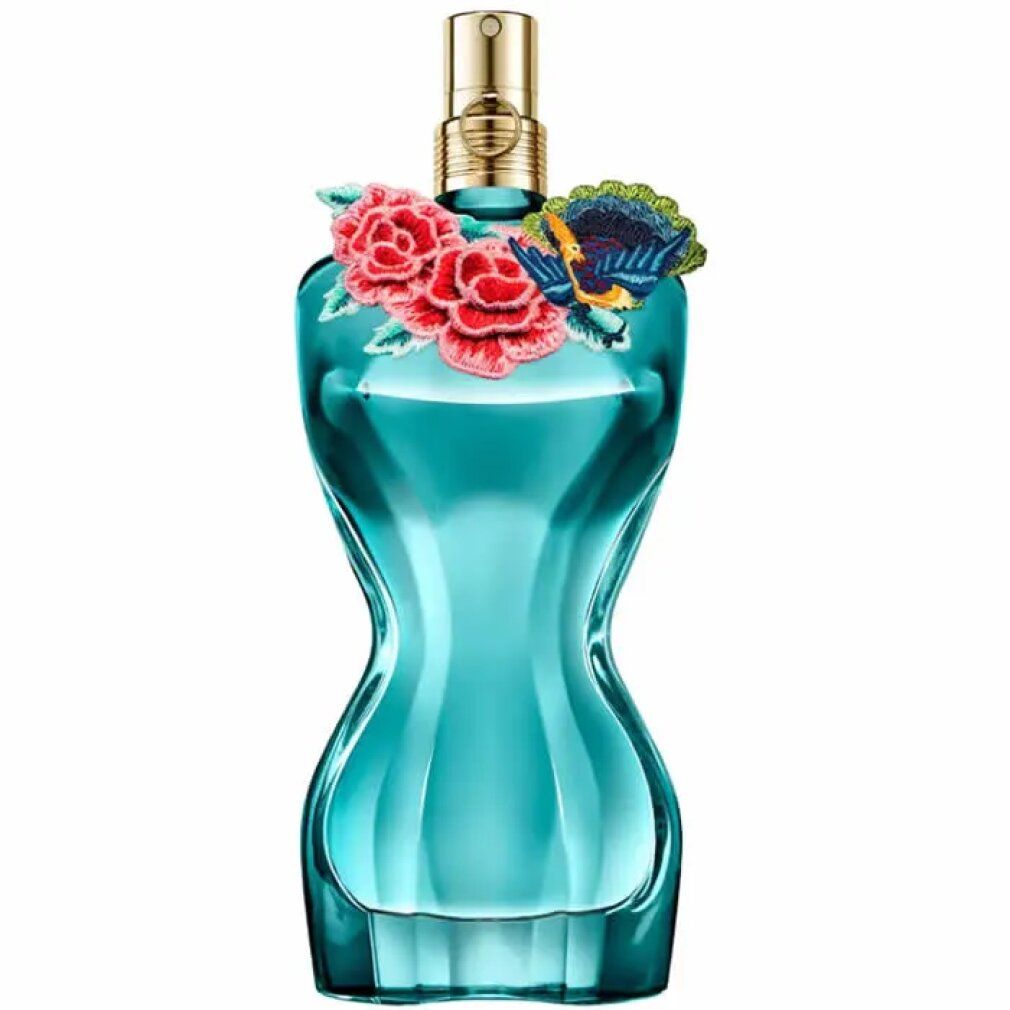 Flacone di profumo azzurro con decorazioni floreali e vaporizzatore dorato. Flacone a forma di corpo femminile.