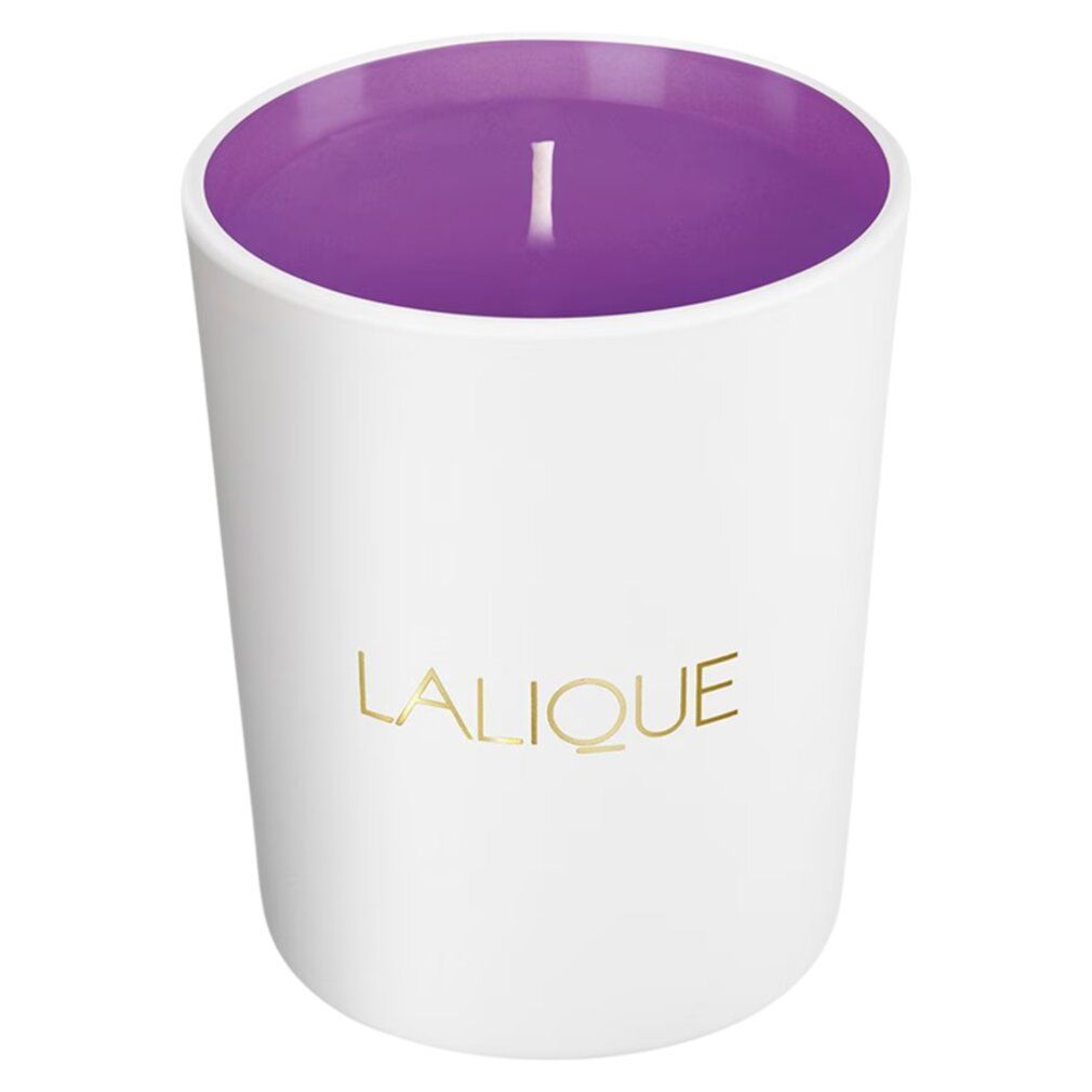 Candela bianca con interno viola. Logo dorato all'esterno. Stoppino visibile.