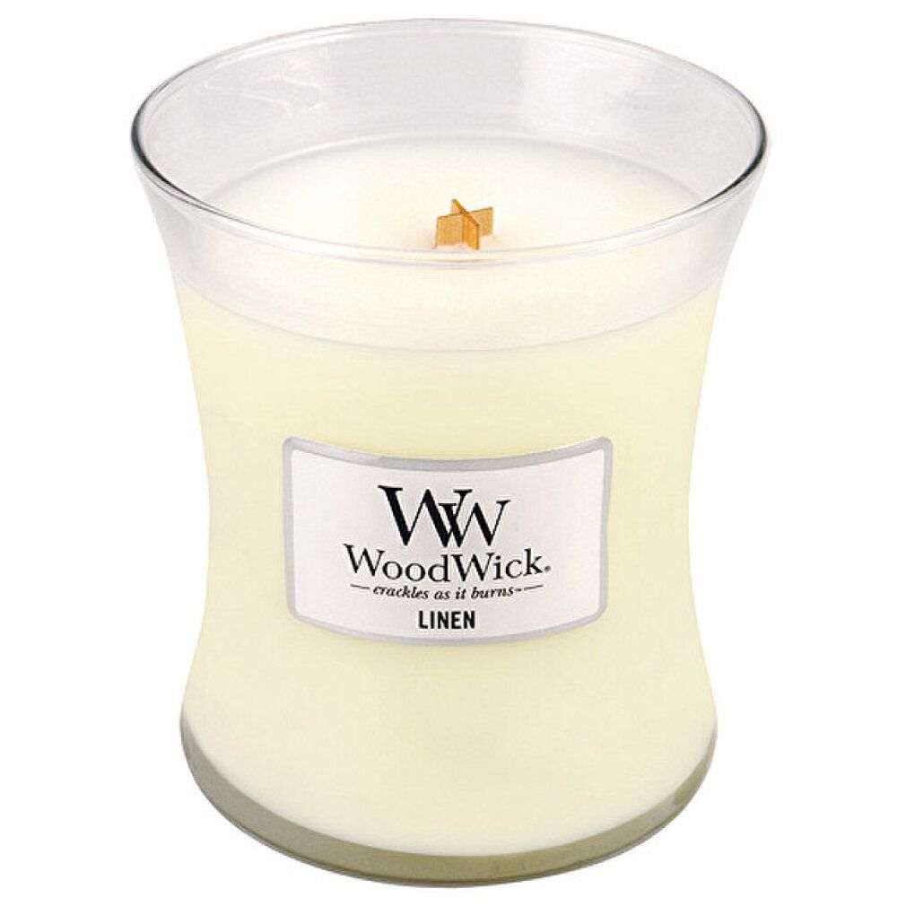 Candela a forma di clessidra con stoppino in legno. L'etichetta recita "WoodWick Linen".