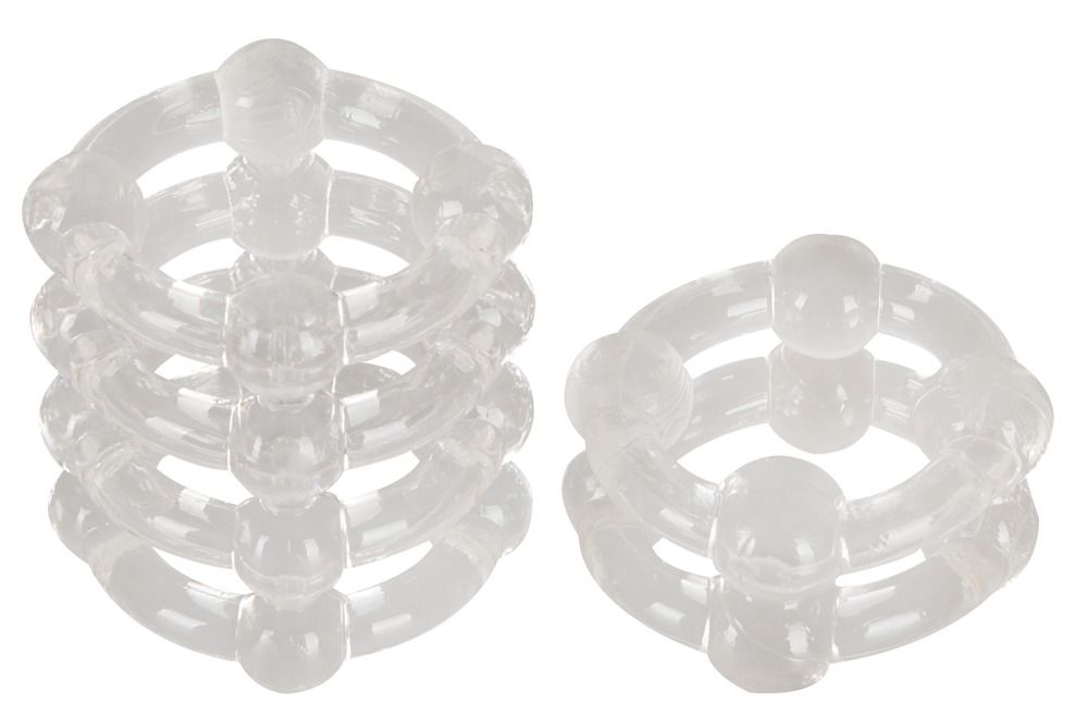 Due prodotti trasparenti ad anello. Una pila di cinque anelli, un anello di tre.