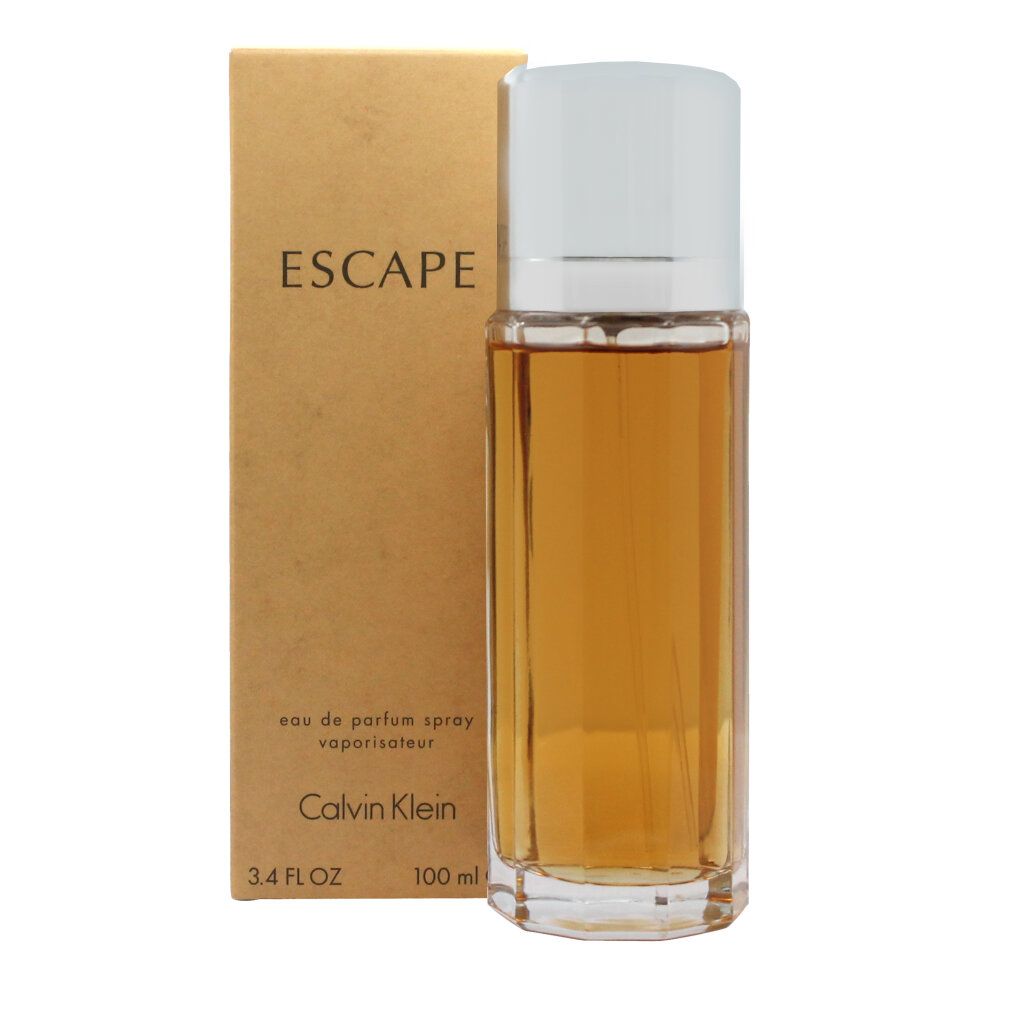 Flacone di profumo e scatola. Flacone con tappo bianco, contenuto dorato. Scatola con scritta "ESCAPE" e "Calvin Klein".