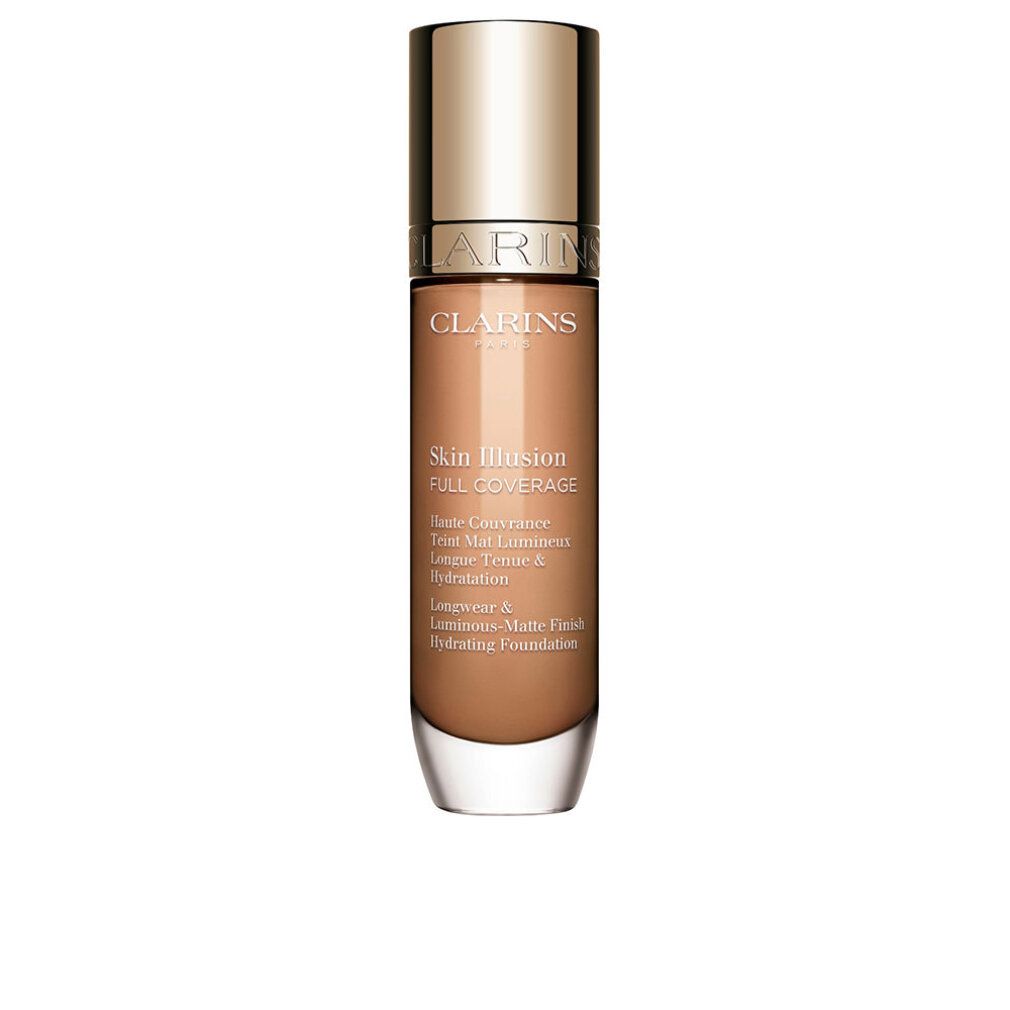 Fondotinta liquido in flacone di vetro con tappo dorato. Scritta: Clarins, Skin Illusion Full Coverage.