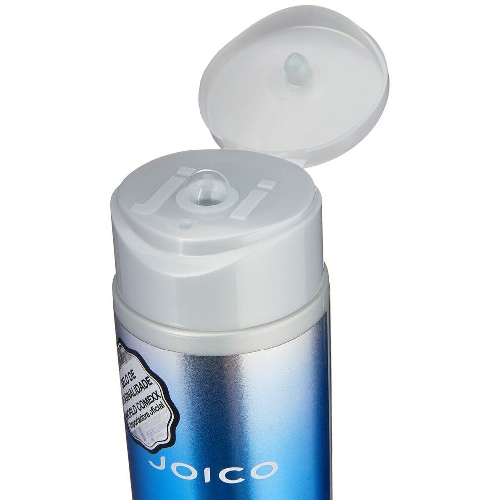 Flacone cilindrico con etichetta blu. Scritte: JOICO, MOISTURE RECOVERY, shampoo idratante.
