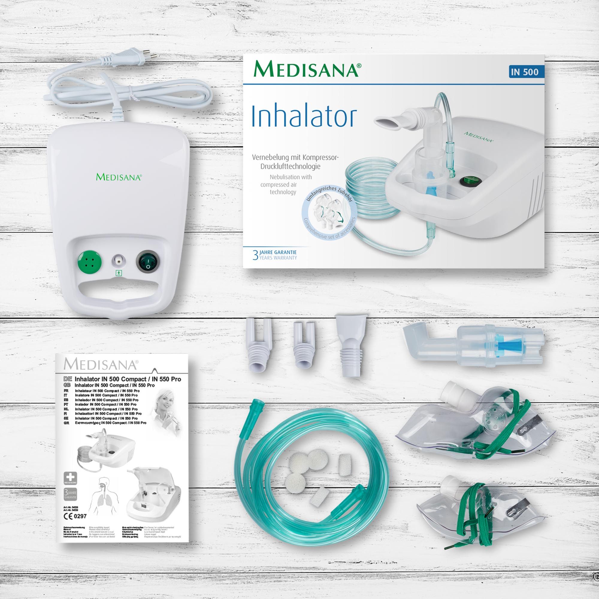 Inalatore Medisana IN 500 con accessori: maschere, boccaglio, adattatore nasale, tubo.