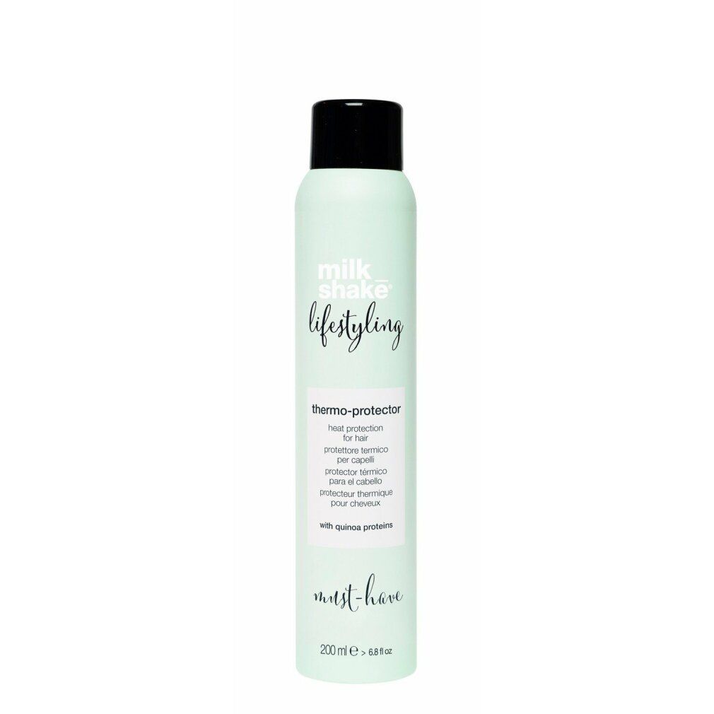 Flacone spray verde chiaro con tappo nero. Scritta: Milk_shake, Lifestyling, Thermo-Protector. Con proteine di quinoa. Volume: 200 ml.