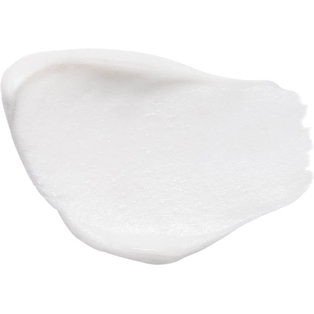 Schiuma bianca su sfondo bianco. Consistenza del prodotto.