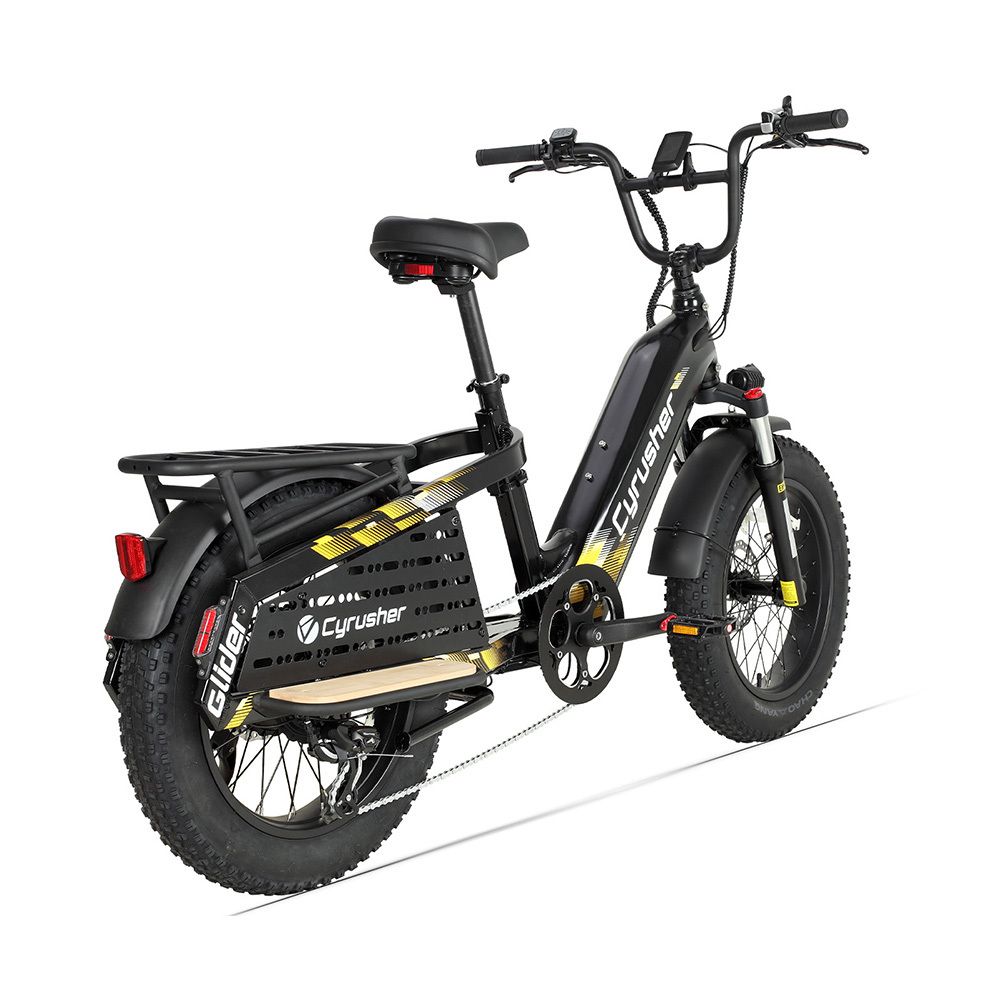 Bicicletta cargo elettrica nera con dettagli gialli. Pneumatici larghi, portapacchi e scritta "Cyrusher Glider".