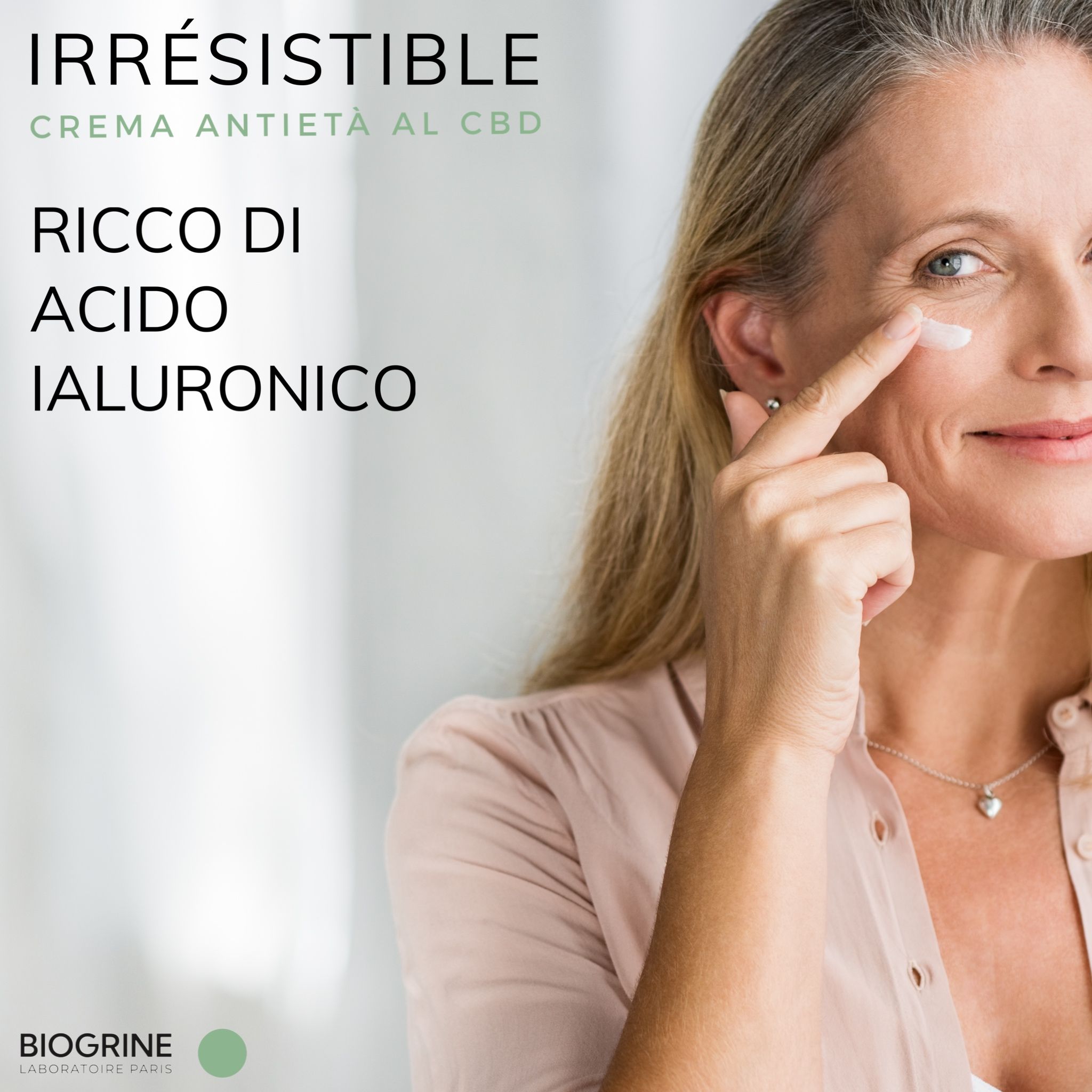 Donna applica crema. Testo: „IRRESISTIBLE“ crema anti-età al CBD. Ricca di acido ialuronico. BIOGRINE.