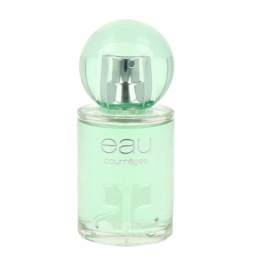 Flacone in vetro verde con tappo argentato. Scritta "eau courrèges".